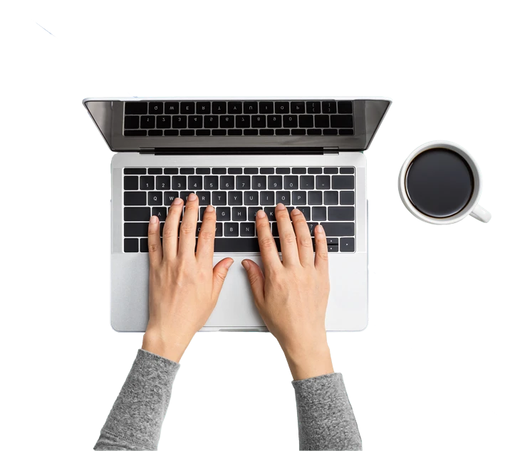 A Person Working with His Hands on Laptop Keypad